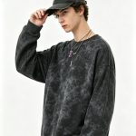 Second view of the acid-wash black crewneck sweatshirt