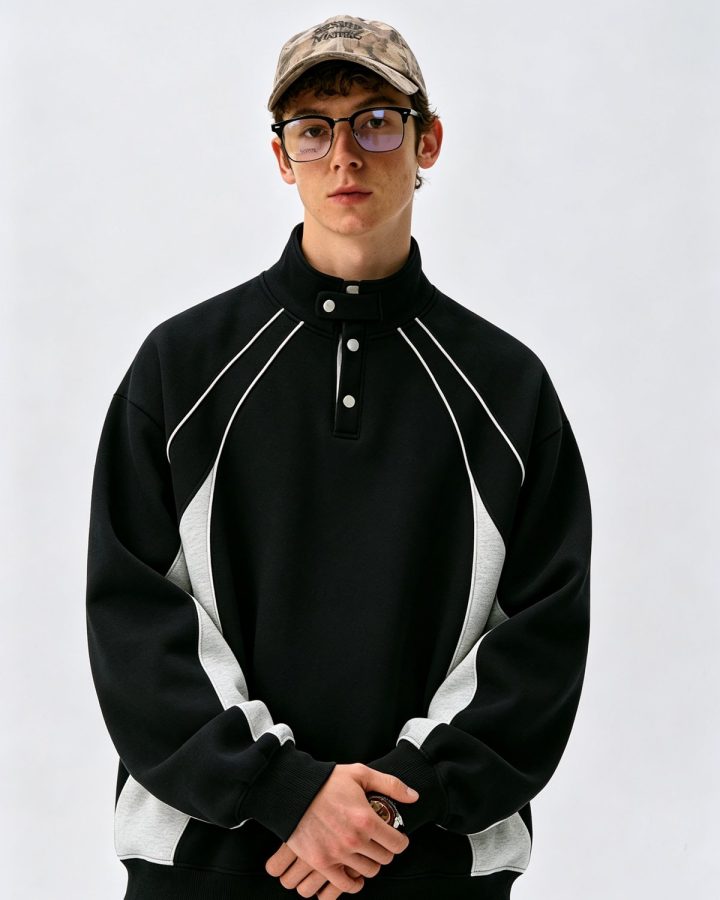 Black and white half-zip track jacket with contrast piping