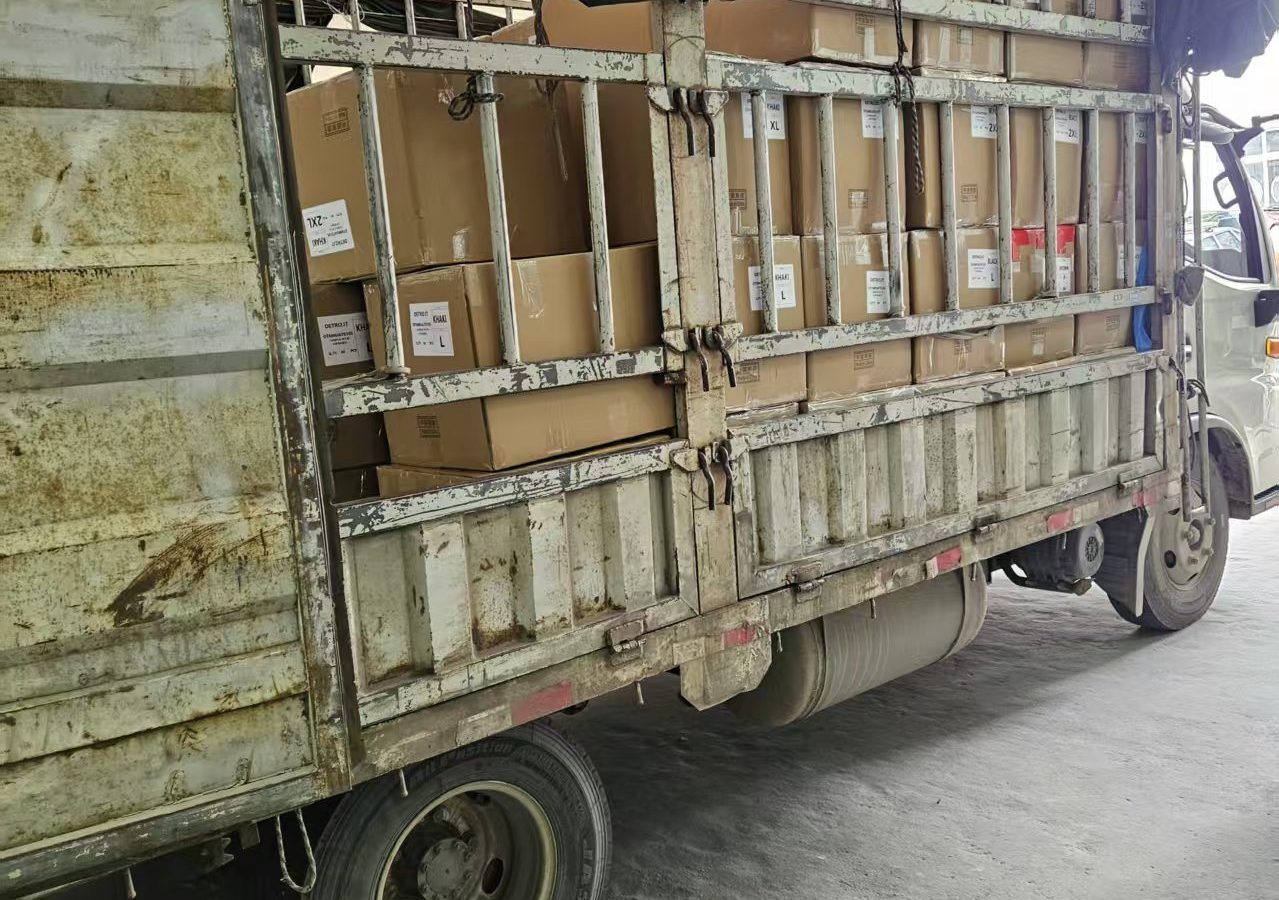 Cartons being loaded into a truck for dispatch