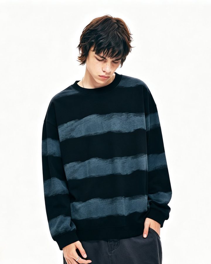 Navy striped knit sweater worn by a model