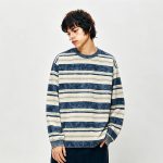 Front view of the striped knit sweater