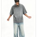 Full-length view of the oversized stone tee