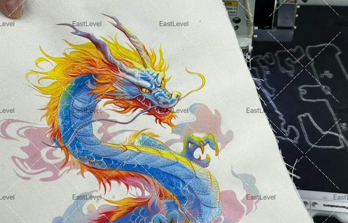 Colourful dragon artwork printed on a white garment panel