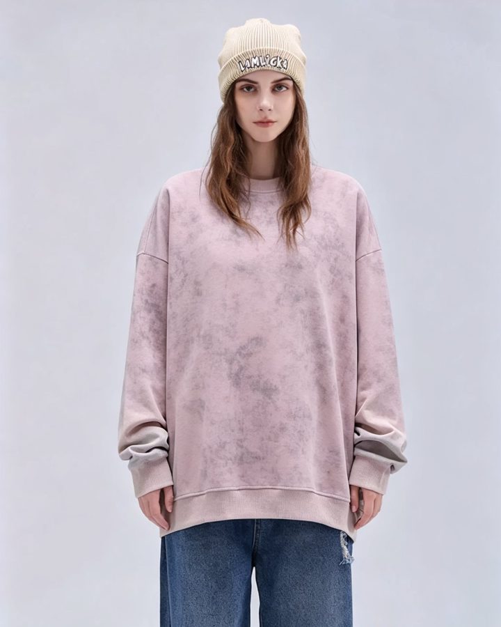 Rose washed fleece sweatshirt worn by a model