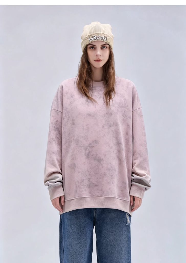 Rose washed fleece sweatshirt worn by a model