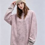 Rose sweatshirt shown from a second angle