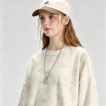 Cream washed sweatshirt detail shot at a second angle