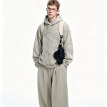 Full-length view of the washed cream crewneck